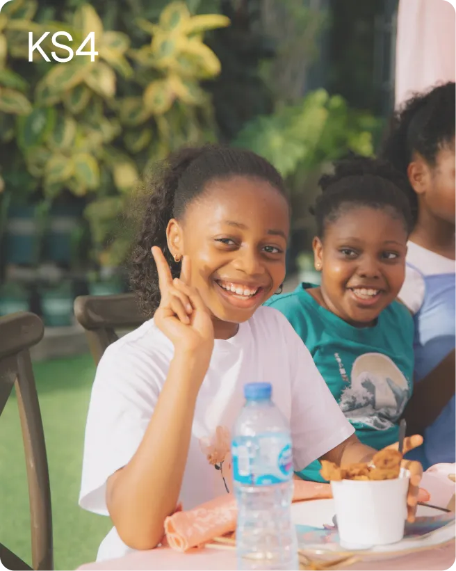 Students studying together at an outdoor table